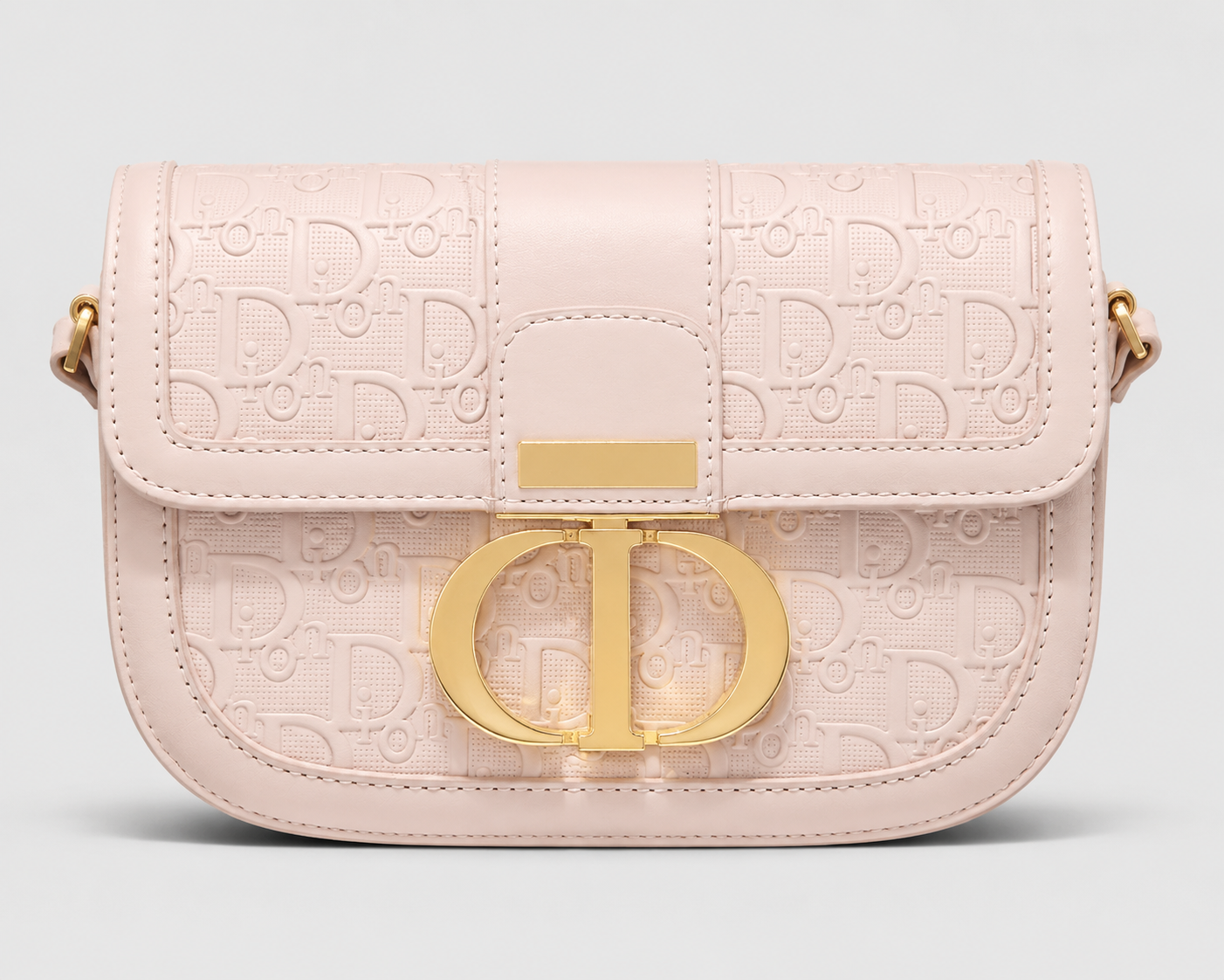 Monogram Embossed Leather Saddle Bag — Blush Pink with Gold CD Clasp & Shoulder Strap