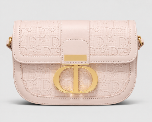 Monogram Embossed Leather Saddle Bag — Blush Pink with Gold CD Clasp & Shoulder Strap